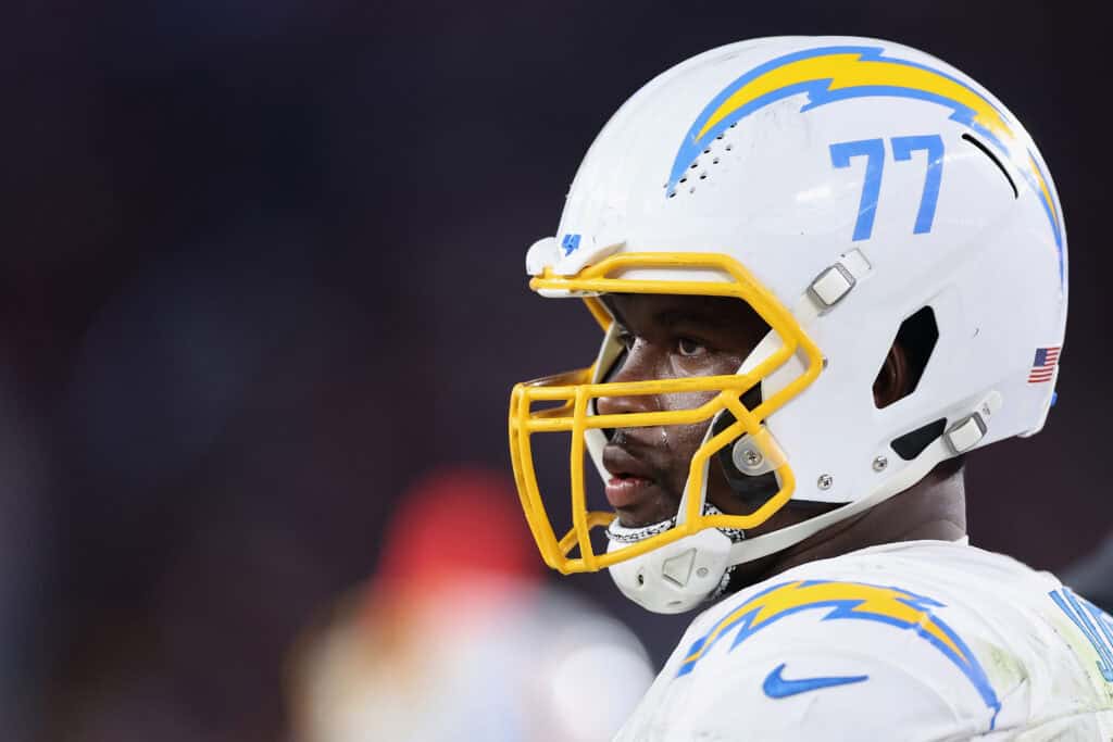 GLENDALE, ARIZONA - OCTOBER 21: Guard Zion Johnson #77 of the Los Angeles Chargers during the NFL game at State Farm Stadium on October 21, 2024 in Glendale, Arizona. The Cardinals defeated the Chargers 17-15.
