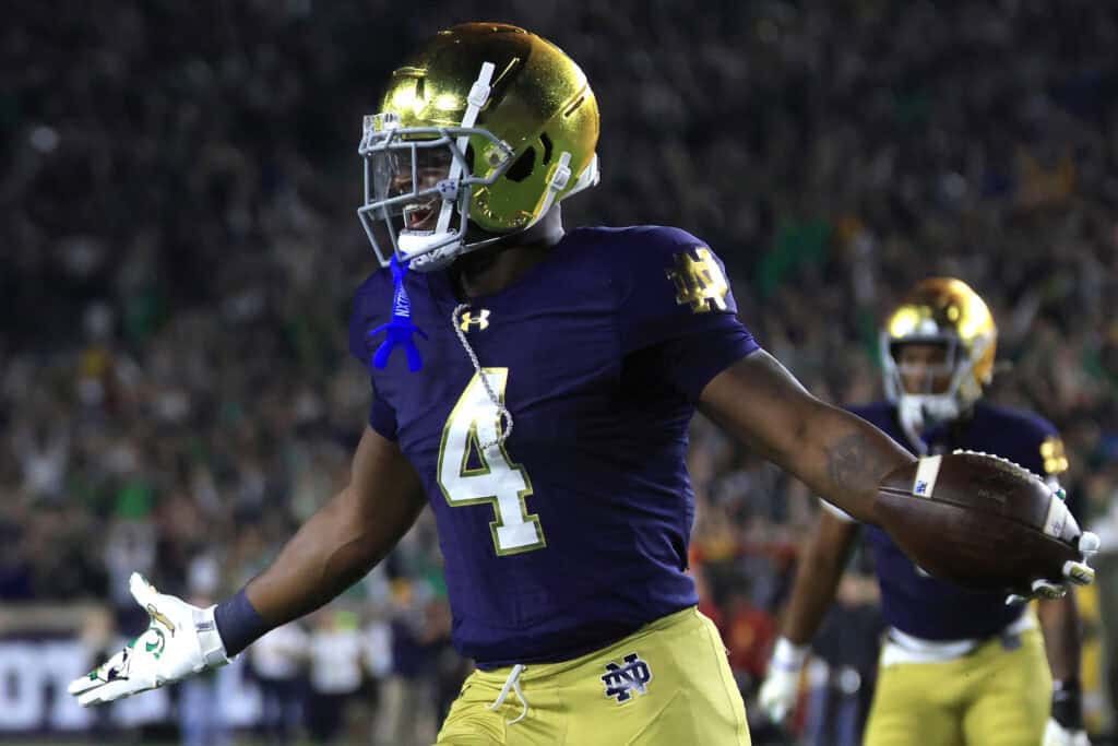 SOUTH BEND, INDIANA - OCTOBER 18: Jeremiyah Love #4 of the Notre Dame Fighting Irish celebrates a touchdown against the USC Trojans at Notre Dame Stadium on October 18, 2025 in South Bend, Indiana.