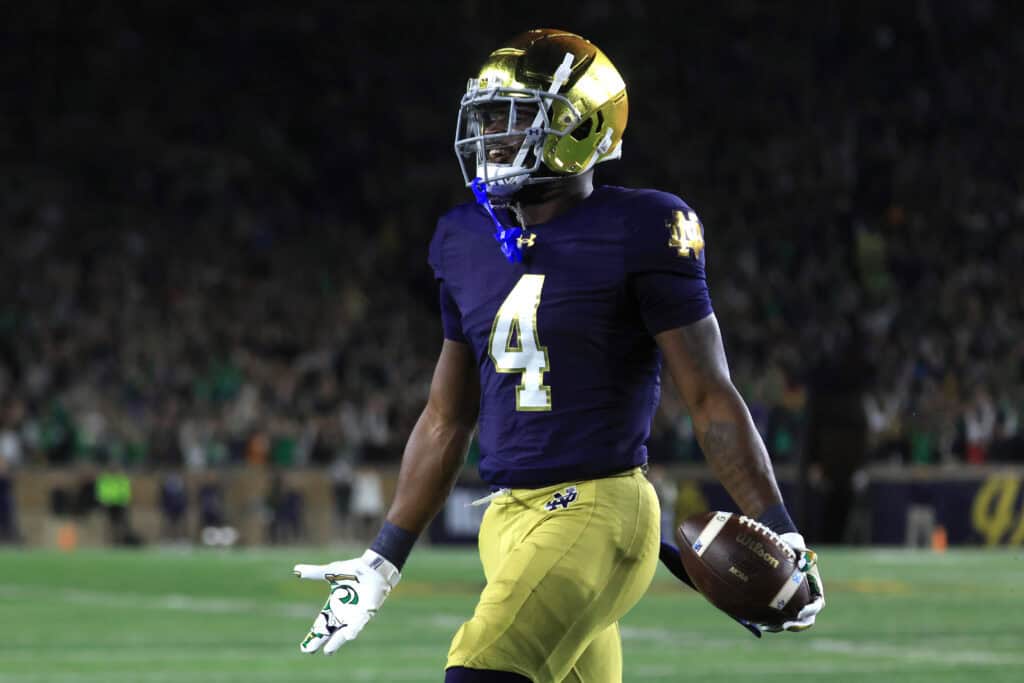 SOUTH BEND, INDIANA - OCTOBER 18: Jeremiyah Love #4 of the Notre Dame Fighting Irish celebrates a touchdown in the first quarter against the USC Trojans at Notre Dame Stadium on October 18, 2025 in South Bend, Indiana