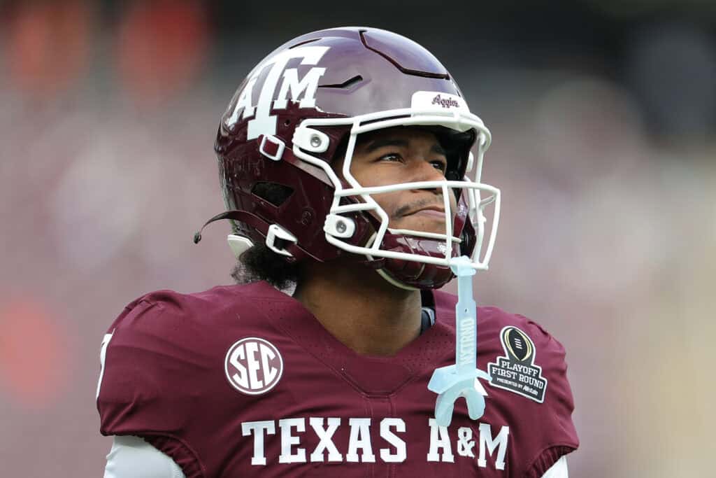 COLLEGE STATION, TEXAS - DECEMBER 20: KC Concepcion #7 of the Texas A&M Aggies warms up prior to the 2025 College Football Playoff First Round Game against the Miami Hurricanes at Kyle Field on December 20, 2025 in College Station, Texas.