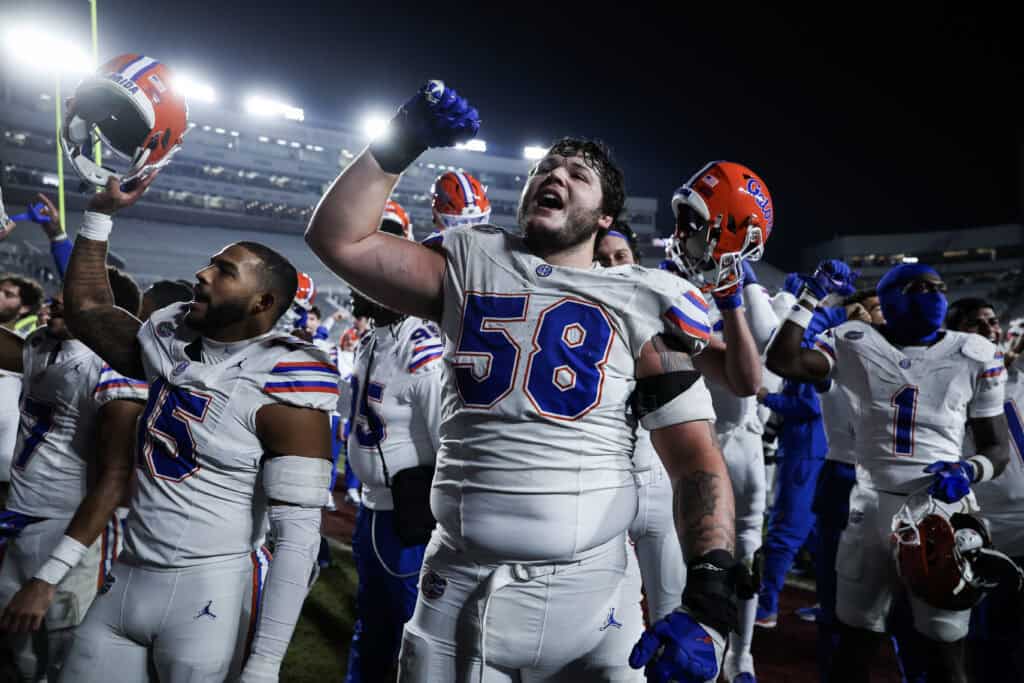 TALLAHASSEE, FLORIDA - NOVEMBER 30: Austin Barber #58 of the Florida Gators celebrates after a game against the Florida State Seminoles of a game at Doak Campbell Stadium on November 30, 2024 in Tallahassee, Florida.