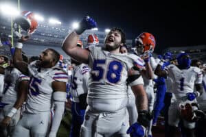 TALLAHASSEE, FLORIDA - NOVEMBER 30: Austin Barber #58 of the Florida Gators celebrates after a game against the Florida State Seminoles of a game at Doak Campbell Stadium on November 30, 2024 in Tallahassee, Florida.