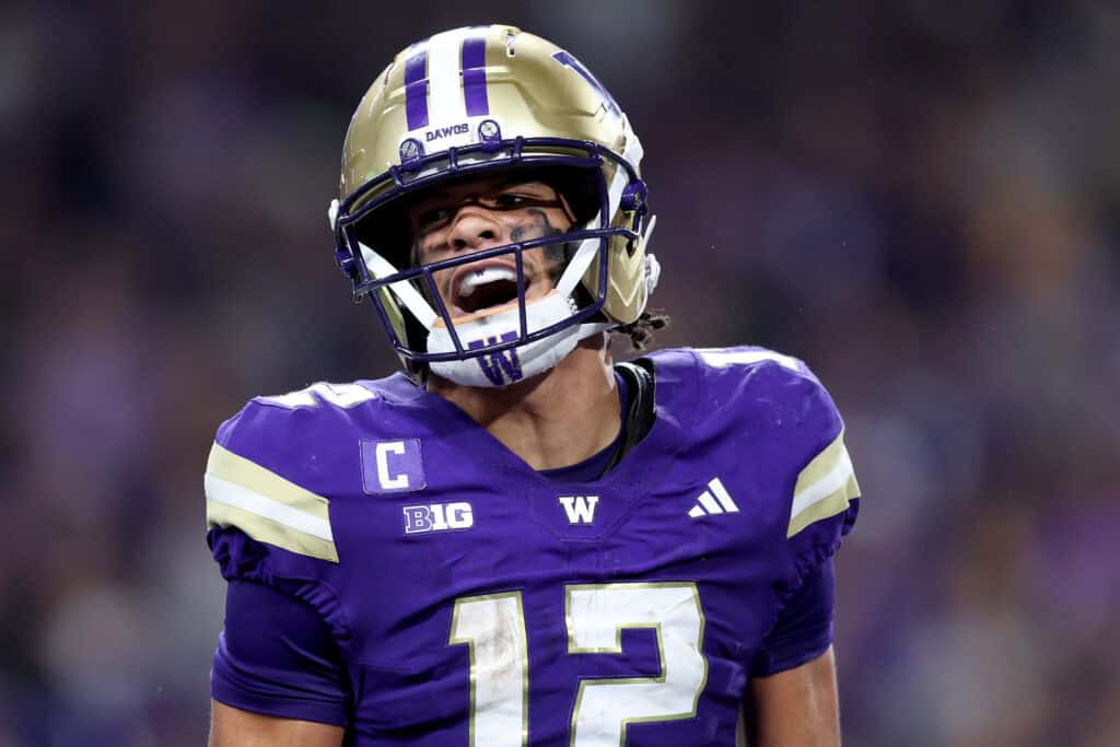 SEATTLE, WASHINGTON - SEPTEMBER 06: Denzel Boston #12 of the Washington Huskies celebrates a touchdown against the UC Davis Aggies at Husky Stadium on September 06, 2025 in Seattle, Washington.