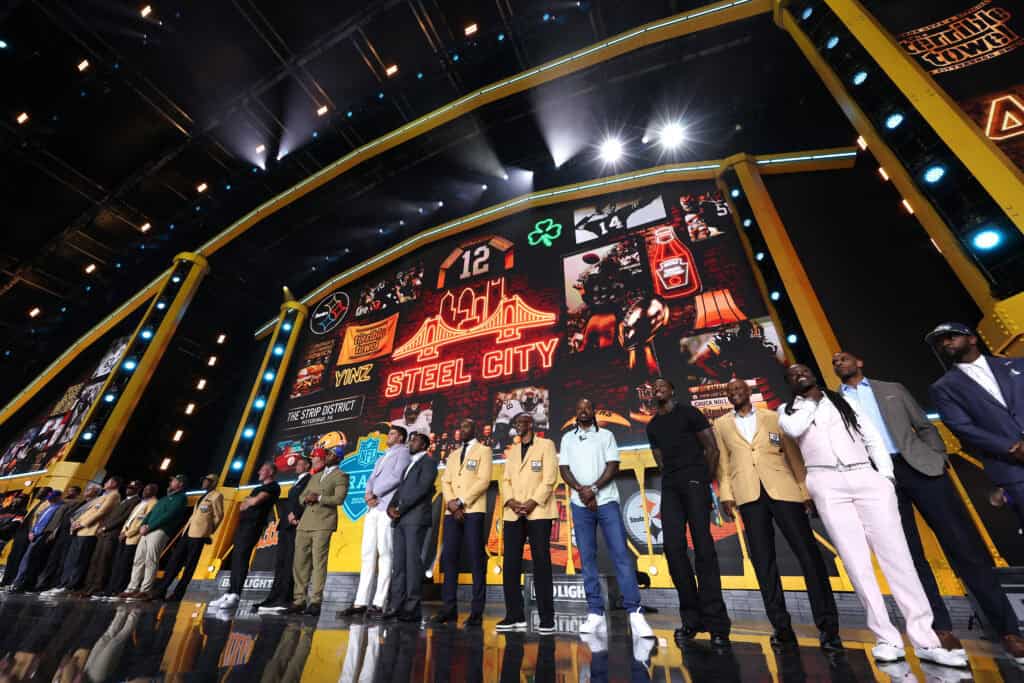 PITTSBURGH, PENNSYLVANIA - APRIL 24: Football legends line the stage during Round Two of the 2026 NFL Draft at Acrisure Stadium on April 24, 2026 in Pittsburgh, Pennsylvania.