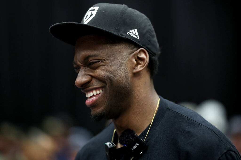 AUSTIN, TEXAS - MARCH 01: Robert Griffin III laughs during conversations at the drivers meeting prior to the NASCAR Cup Series DuraMax Grand Prix Powered by RelaDyne at Circuit of The Americas on March 01, 2026 in Austin, Texas.