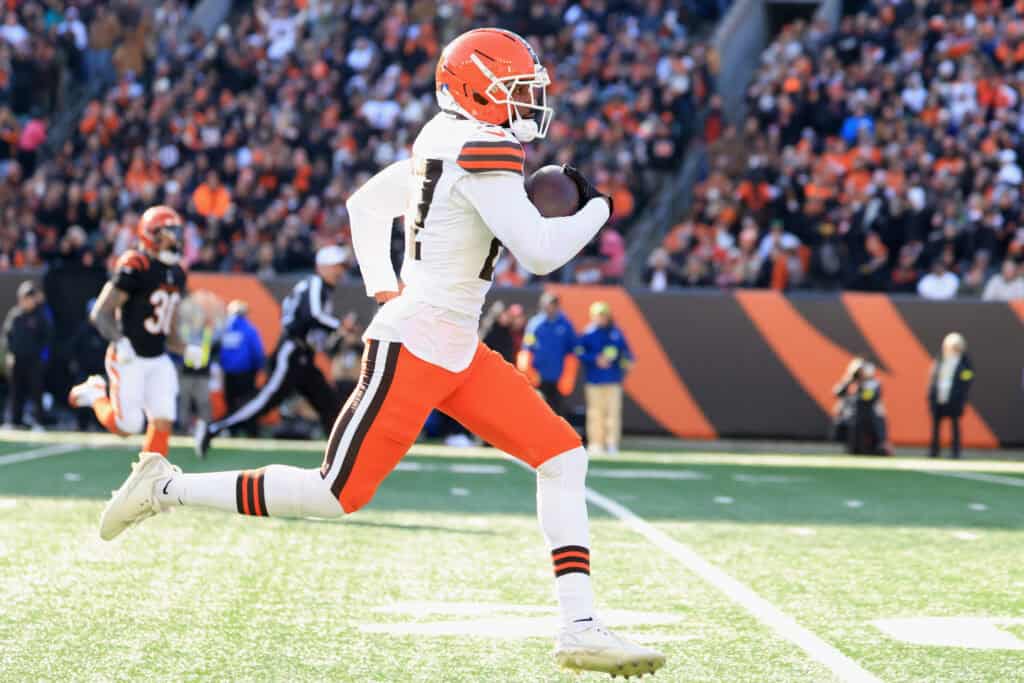CINCINNATI, OHIO - JANUARY 04: Sam Webb #27 of the Cleveland Browns runs after recovering a fumble during the second quarter of the game against the Cincinnati Bengals at Paycor Stadium on January 04, 2026 in Cincinnati, Ohio.