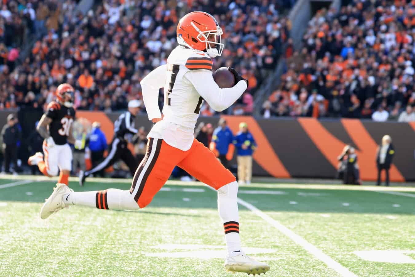 CINCINNATI, OHIO - JANUARY 04: Sam Webb #27 of the Cleveland Browns runs after recovering a fumble during the second quarter of the game against the Cincinnati Bengals at Paycor Stadium on January 04, 2026 in Cincinnati, Ohio.