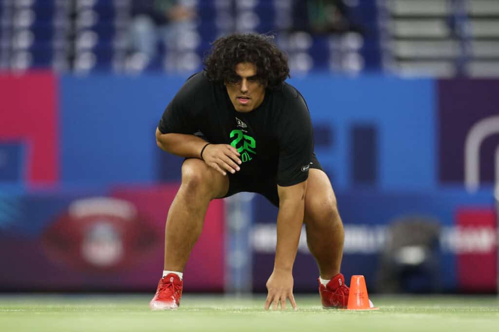 INDIANAPOLIS, INDIANA - MARCH 01: Spencer Fano of the Utah Utes participates in a drill during the 2026 NFL Scouting Combine at Lucas Oil Stadium on March 01, 2026 in Indianapolis, Indiana.