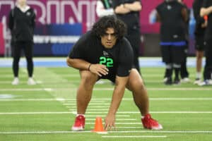 INDIANAPOLIS, INDIANA - MARCH 01: Spencer Fano of the Utah Utes participates in a drill during the 2026 NFL Scouting Combine at Lucas Oil Stadium on March 01, 2026 in Indianapolis, Indiana.