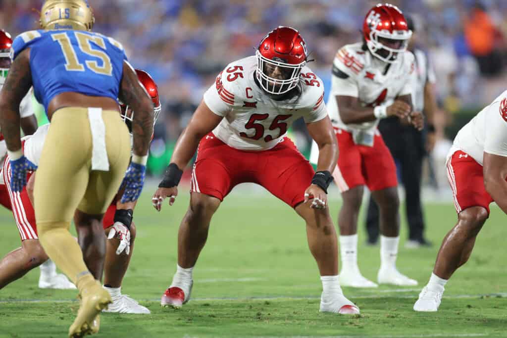PASADENA, CALIFORNIA - AUGUST 30: Spencer Fano #55 of the Utah Utes llines up on the defensive line during the second half of a game against the UCLA Bruins at Rose Bowl Stadium on August 30, 2025 in Pasadena, California.
