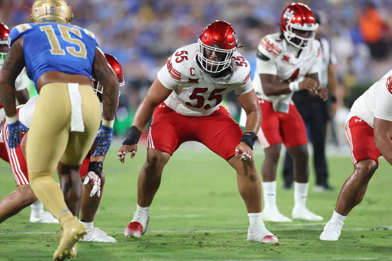 PASADENA, CALIFORNIA - AUGUST 30: Spencer Fano #55 of the Utah Utes llines up on the defensive line during the second half of a game against the UCLA Bruins at Rose Bowl Stadium on August 30, 2025 in Pasadena, California.