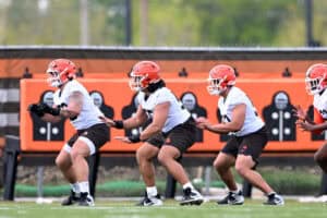 BEREA, OHIO - MAY 08: Austin Barber #58, Spencer Fano #55 and Parker Brailsford #52 of the Cleveland Browns run a drill during a rookie minicamp at CrossCountry Mortgage Campus on May 08, 2026 in Berea, Ohio.