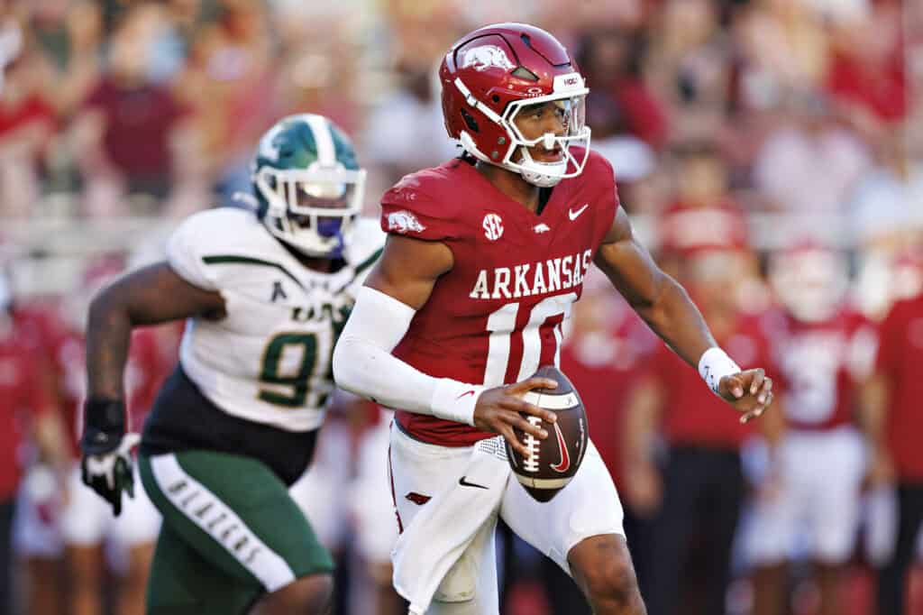 FAYETTEVILLE, ARKANSAS - SEPTEMBER 14: Taylen Green #10 of the Arkansas Razorbacks rolls out looking for a receiver in the second half during a game against the UAB Blazers at Donald W. Reynolds Razorback Stadium on September 14, 2024 in Fayetteville, Arkansas. The Razorbacks defeated the Blazers 37-27.