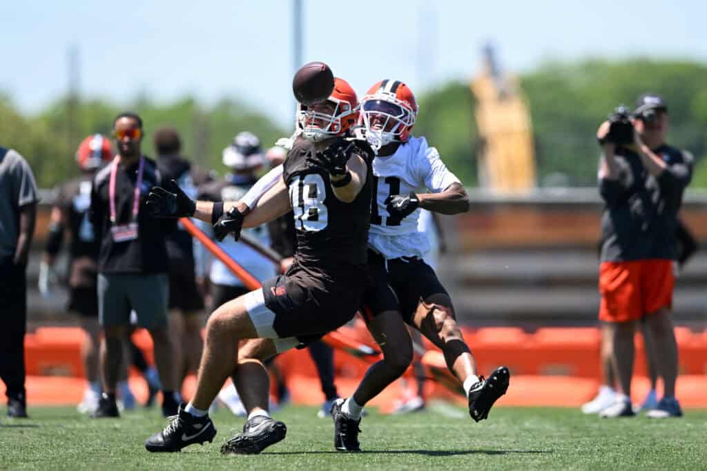 BEREA, OHIO - JUNE 03: Carsen Ryan #48 of the Cleveland Browns catches a pass against Tre Avery #11 during the Cleveland Browns OTA Offseason Workouts at CrossCountry Mortgage Campus on June 03, 2026 in Berea, Ohio.