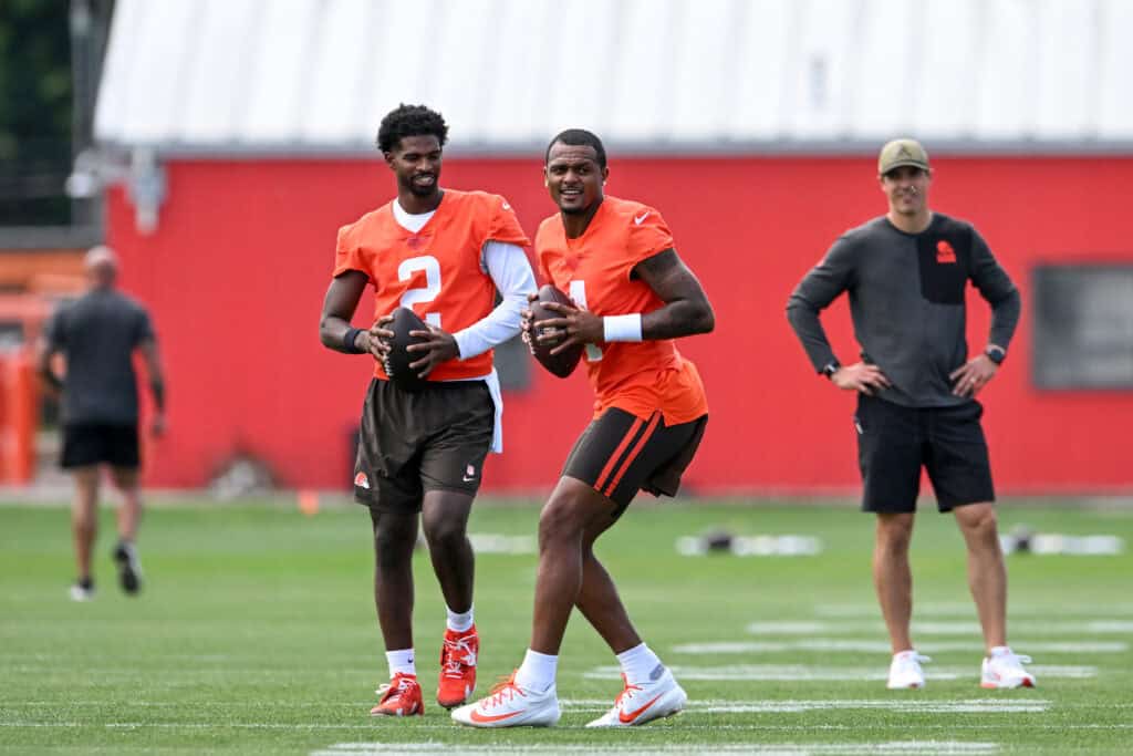 BEREA, OHIO - JUNE 11: Deshaun Watson #4 and Shedeur Sanders #2 of the Cleveland Browns run a drill during the Cleveland Browns Mandatory Minicamp at CrossCountry Mortgage Campus on June 11, 2026 in Berea, Ohio.