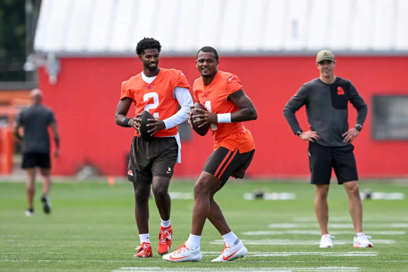 BEREA, OHIO - JUNE 11: Deshaun Watson #4 and Shedeur Sanders #2 of the Cleveland Browns run a drill during the Cleveland Browns Mandatory Minicamp at CrossCountry Mortgage Campus on June 11, 2026 in Berea, Ohio.