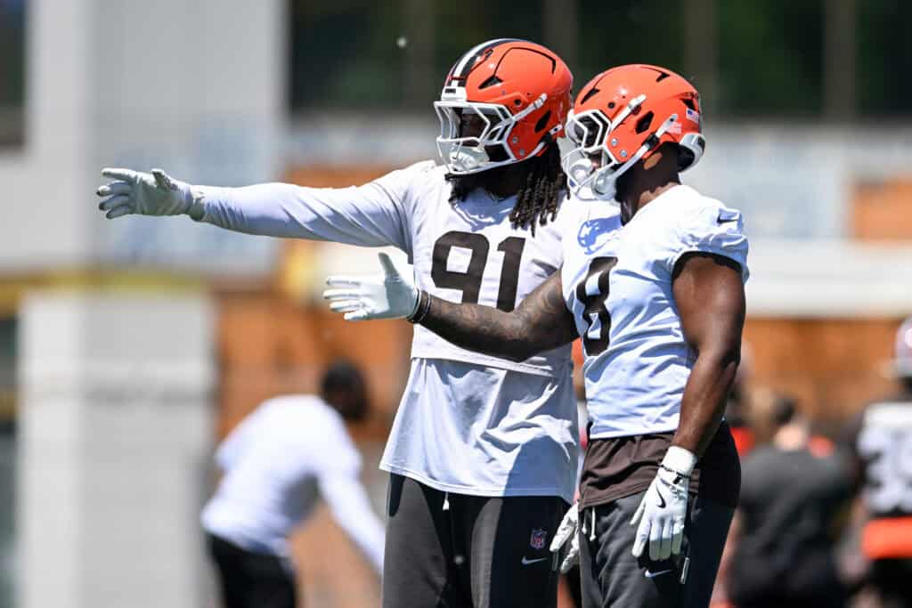 BEREA, OHIO - JUNE 03: Alex Wright #91 of the Cleveland Browns instructs Jared Verse #8 during the Cleveland Browns OTA Offseason Workouts at CrossCountry Mortgage Campus on June 03, 2026 in Berea, Ohio.