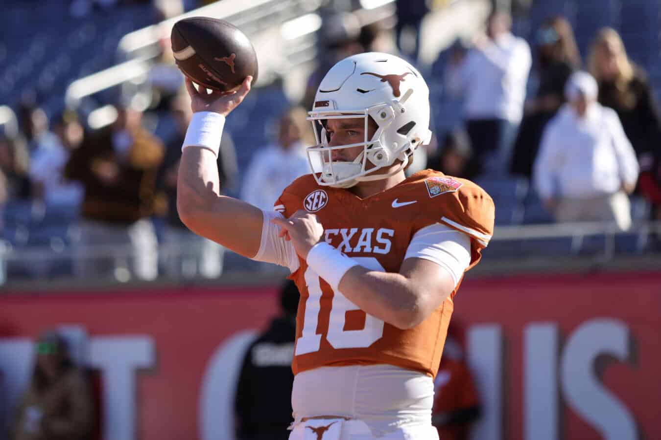 ORLANDO, FLORIDA - DECEMBER 31: Arch Manning #16 of the Texas Longhorns warms up before the 2025 Cheez-It Citrus Bowl between the Texas Longhorns and Michigan Wolverines at Camping World Stadium on December 31, 2025 in Orlando, Florida.
