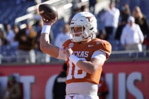 ORLANDO, FLORIDA - DECEMBER 31: Arch Manning #16 of the Texas Longhorns warms up before the 2025 Cheez-It Citrus Bowl between the Texas Longhorns and Michigan Wolverines at Camping World Stadium on December 31, 2025 in Orlando, Florida.