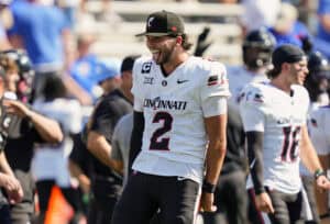 LAWRENCE, KANSAS - SEPTEMBER 27: Brendan Sorsby #2 of the Cincinnati Bearcats celebrates after defeating the Kansas Jayhawks at David Booth Kansas Memorial Stadium on September 27, 2025 in Lawrence, Kansas.