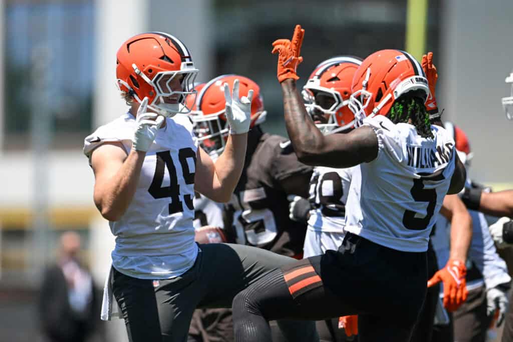 BEREA, OHIO - JUNE 03: Carson Schwesinger #49 and Quincy Williams #5 of the Cleveland Browns celebrate during the Cleveland Browns OTA Offseason Workouts at CrossCountry Mortgage Campus on June 03, 2026 in Berea, Ohio.