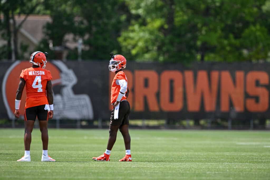 BEREA, OHIO - JUNE 11: Deshaun Watson #4 and Shedeur Sanders #2 of the Cleveland Browns run a drill during the Cleveland Browns Mandatory Minicamp at CrossCountry Mortgage Campus on June 11, 2026 in Berea, Ohio.