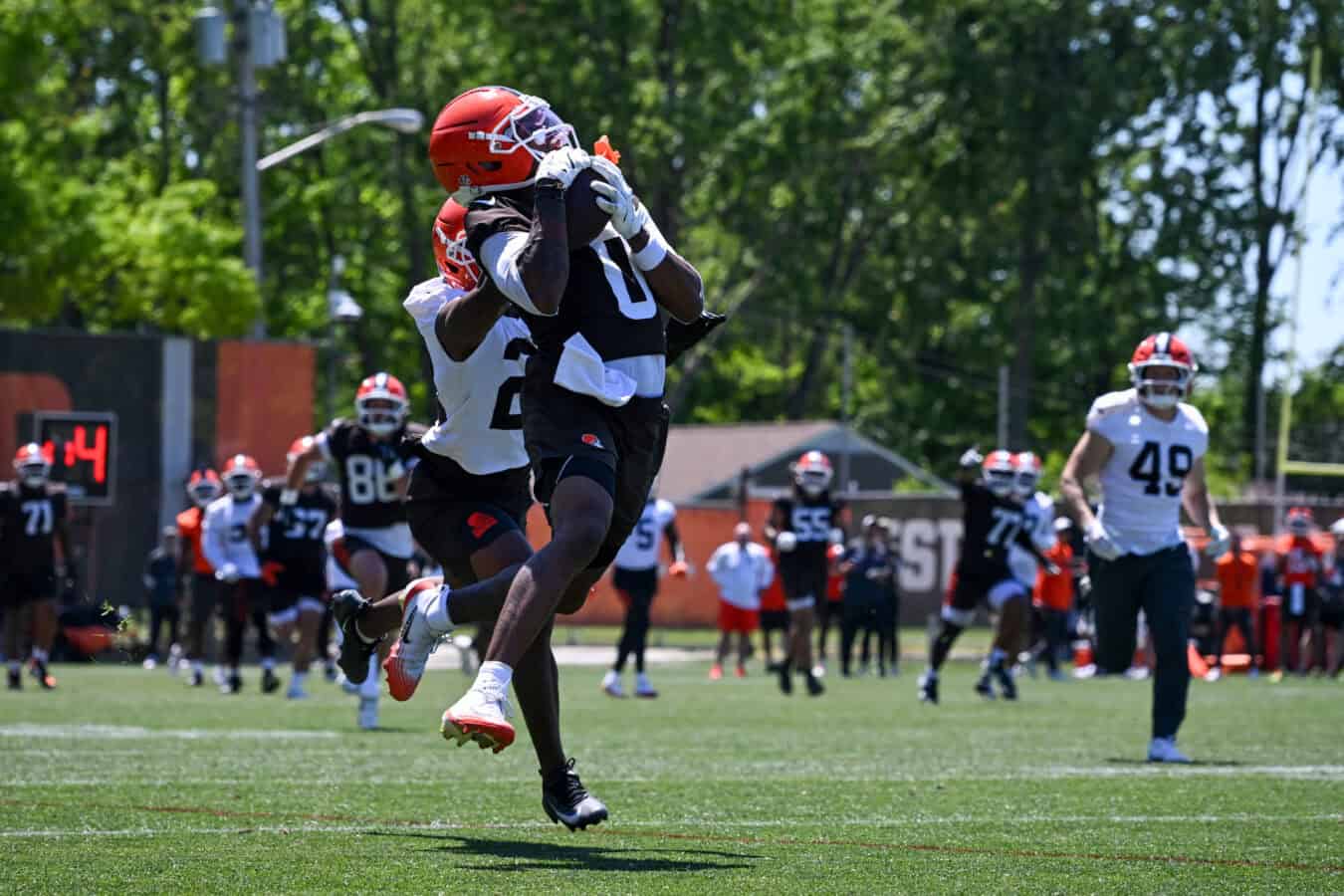 BEREA, OHIO - JUNE 03: Isaiah Bond #0 of the Cleveland Browns catches a pass against D'Angelo Ross #20 during the Cleveland Browns OTA Offseason Workouts at CrossCountry Mortgage Campus on June 03, 2026 in Berea, Ohio.