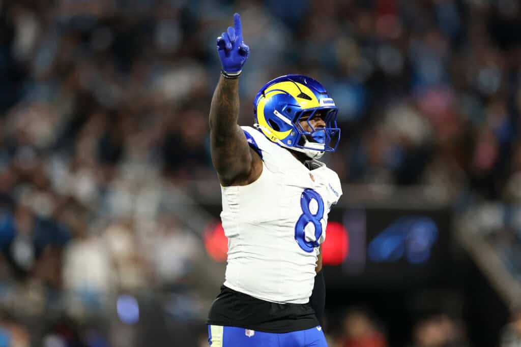 CHARLOTTE, NORTH CAROLINA - JANUARY 10: Jared Verse #8 of the Los Angeles Rams reacts during the NFC Wild Card Playoff game against the Carolina Panthers at Bank of America Stadium on January 10, 2026 in Charlotte, North Carolina.