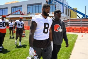 BEREA, OHIO - JUNE 03: Jared Verse #8 of the Cleveland Browns talks with defensive line coach Jaques Casaire after the Cleveland Browns OTA Offseason Workouts at CrossCountry Mortgage Campus on June 03, 2026 in Berea, Ohio.