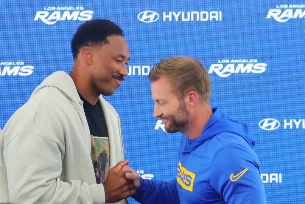 WOODLAND HILLS, CALIFORNIA - JUNE 2: Myles Garrett #95 of the Los Angeles Rams shakes hands with head coach Sean McVay during a press conference after an organized team activities workout at Rams Village at the Warner Center on June 2, 2026 in Woodland Hills, California.