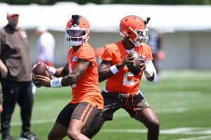 BEREA, OHIO - JULY 29: Deshaun Watson #4 and Shedeur Sanders #2 of the Cleveland Browns look to pass during Cleveland Browns Training Camp at CrossCountry Mortgage Campus on July 29, 2026 in Berea, Ohio.
