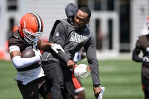 BEREA, OHIO - JULY 29: Defensive backs coach/pass game specialist Brandon Lynch of the Cleveland Browns (R) celebrates an interception by Michael Coats Jr. #39 during Cleveland Browns Training Camp at CrossCountry Mortgage Campus on July 29, 2026 in Berea, Ohio.