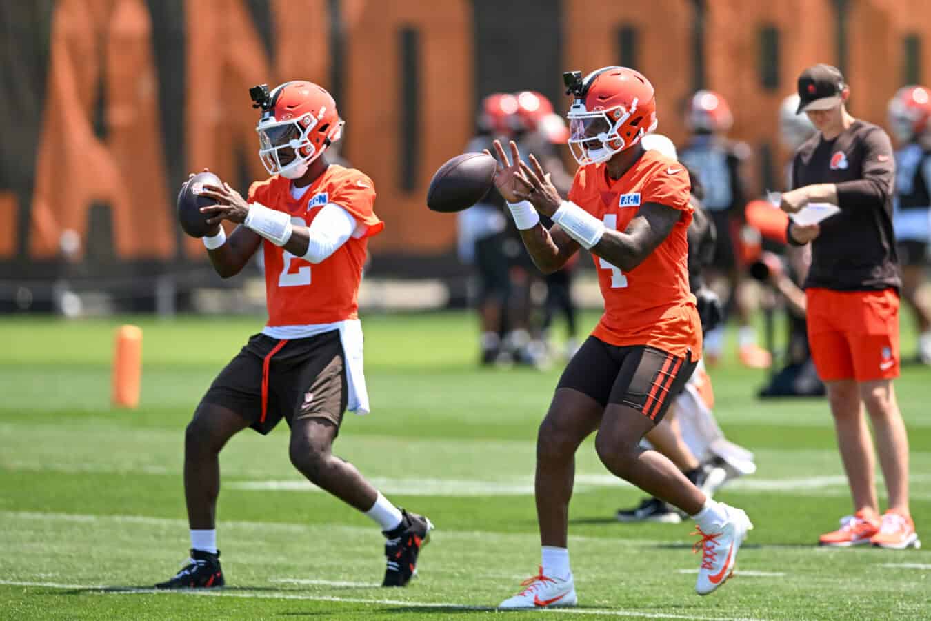 BEREA, OHIO - JULY 29: Shedeur Sanders #2 and Deshaun Watson #4 of the Cleveland Browns run a drill during Cleveland Browns Training Camp at CrossCountry Mortgage Campus on July 29, 2026 in Berea, Ohio.