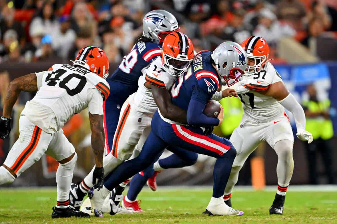 CLEVELAND, OHIO - AUGUST 27: Linebacker Justin Jefferson #17 of the Cleveland Browns sacks quarterback Behren Morton #15 of the New England Patriots during the third quarter of a preseason game at Huntington Bank Field on August 27, 2026, in Cleveland, Ohio. The Browns defeated the Patriots 37-13.