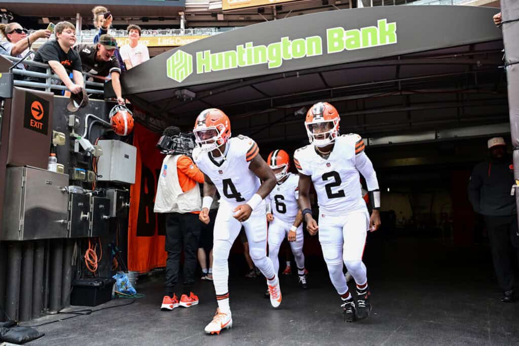 CLEVELAND, OHIO - AUGUST 22: Deshaun Watson #4, Shedeur Sanders #2 and Dillon Gabriel #6 of the Cleveland Browns take the field prior to a preseason game against the Buffalo Bills at Huntington Bank Field on August 22, 2026 in Cleveland, Ohio.
