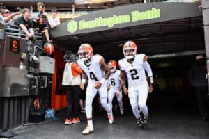 CLEVELAND, OHIO - AUGUST 22: Deshaun Watson #4, Shedeur Sanders #2 and Dillon Gabriel #6 of the Cleveland Browns take the field prior to a preseason game against the Buffalo Bills at Huntington Bank Field on August 22, 2026 in Cleveland, Ohio.