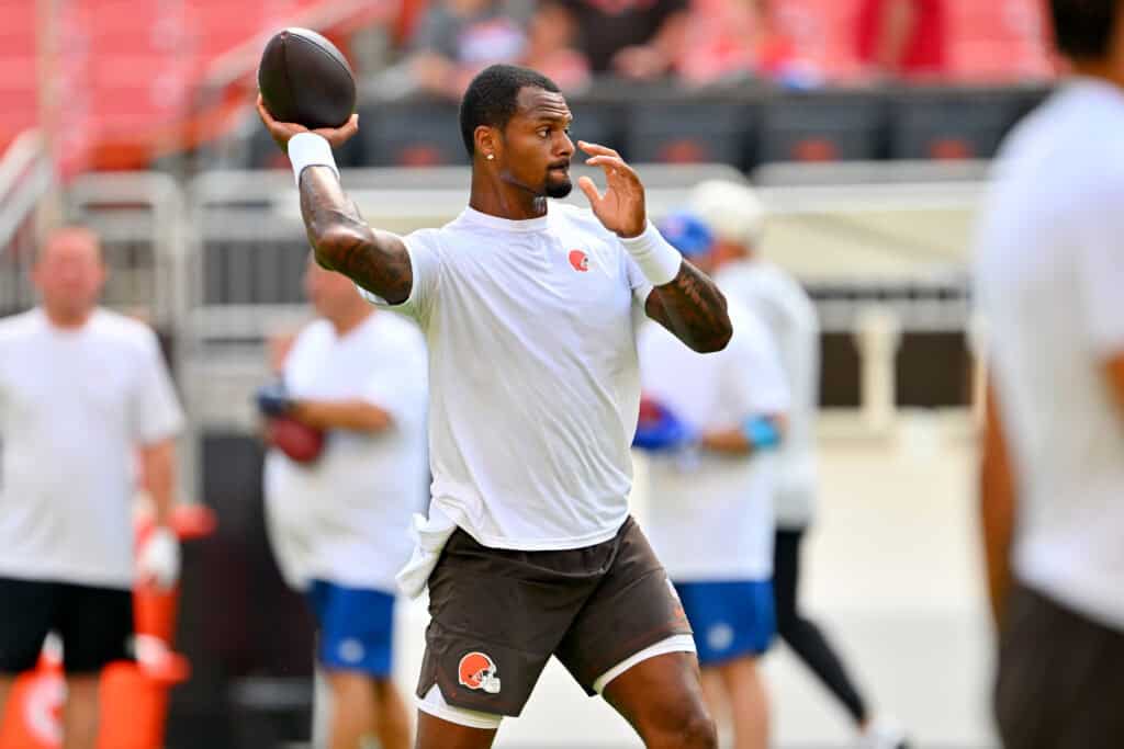 CLEVELAND, OHIO - AUGUST 22: Quarterback Deshaun Watson #4 of the Cleveland Browns warms up before a preseason game against the Buffalo Bills at Huntington Bank Field on August 22, 2026 in Cleveland, Ohio.