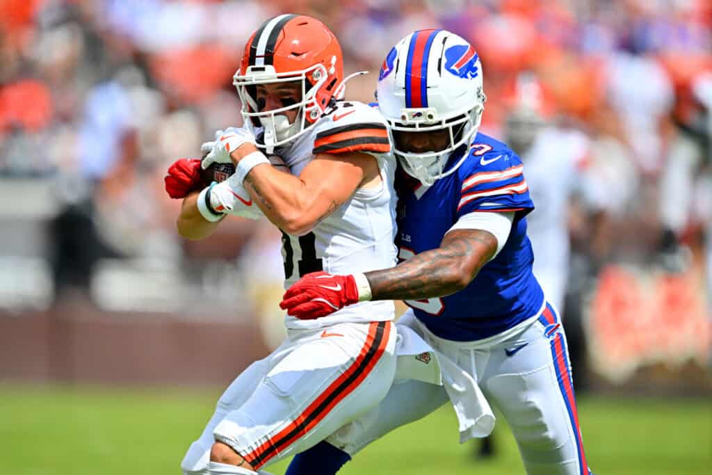 CLEVELAND, OHIO - AUGUST 22: Wide receiver Luke Floriea #81 of the Cleveland Browns is tackled by safety Damar Hamlin #3 of the Buffalo Bills during the second quarter of the preseason game at Huntington Bank Field on August 22, 2026, in Cleveland, Ohio.