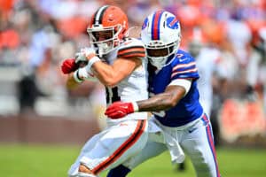 CLEVELAND, OHIO - AUGUST 22: Wide receiver Luke Floriea #81 of the Cleveland Browns is tackled by safety Damar Hamlin #3 of the Buffalo Bills during the second quarter of the preseason game at Huntington Bank Field on August 22, 2026, in Cleveland, Ohio.
