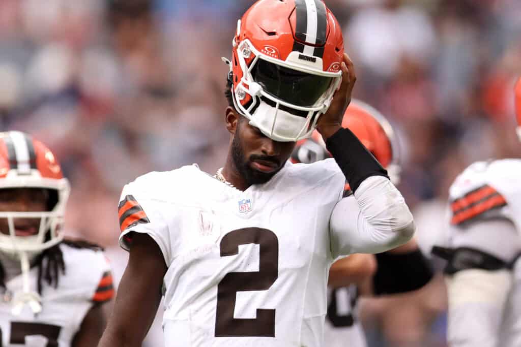 CHICAGO, ILLINOIS - AUGUST 15: Shedeur Sanders #2 of the Cleveland Browns removes his helmet and returns to the bench during the third quarter of a preseason game against the Chicago Bears at Soldier Field on August 15, 2026 in Chicago, Illinois.