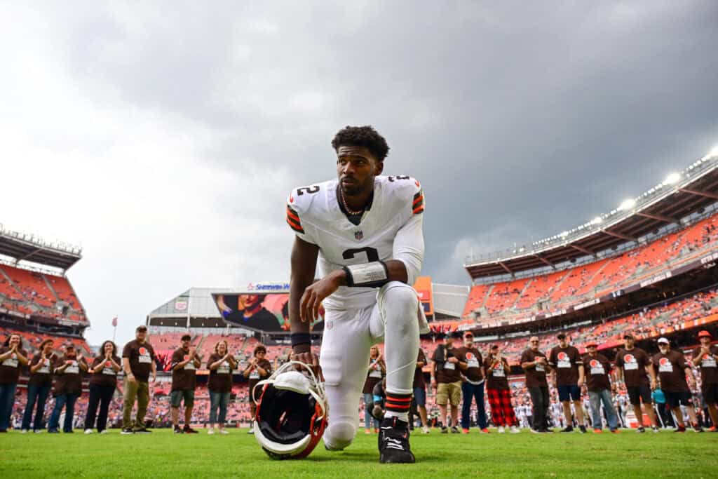 CLEVELAND, OHIO - AUGUST 22: Shedeur Sanders #2 of the Cleveland Browns kneels to pray prior to a preseason game against the Buffalo Bills at Huntington Bank Field on August 22, 2026 in