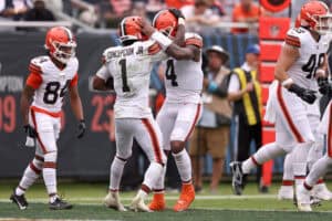 CHICAGO, ILLINOIS - AUGUST 15: Kc Concepcion #1 of the Cleveland Browns celebrates scoring a touchdown with teammate Deshaun Watson #4 during the second quarter of a preseason game against the Chicago Bears at Soldier Field on August 15, 2026 in Chicago, Illinois.