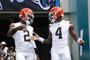 JACKSONVILLE, FLORIDA - SEPTEMBER 13: (L-R) Shedeur Sanders #2 of the Cleveland Browns and Deshaun Watson #4 take the the field for warmups prior to the game against the Jacksonville Jaguars at EverBank Stadium on September 13, 2026 in Jacksonville, Florida.