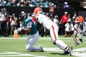 JACKSONVILLE, FLORIDA - SEPTEMBER 13: Josh Cameron #19 of the Jacksonville Jaguars scores a touchdown against the Cleveland Browns during the first quarter of the game at EverBank Stadium on September 13, 2026 in Jacksonville, Florida.