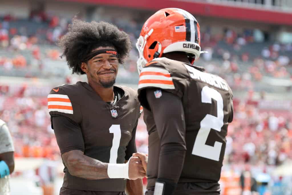 TAMPA, FLORIDA - SEPTEMBER 20: Kc Concepcion #1 of the Cleveland Browns and Shedeur Sanders #2 high five during warm ups prior to the game against the Tampa Bay Buccaneers at Raymond James Stadium on September 20, 2026 in Tampa, Florida.