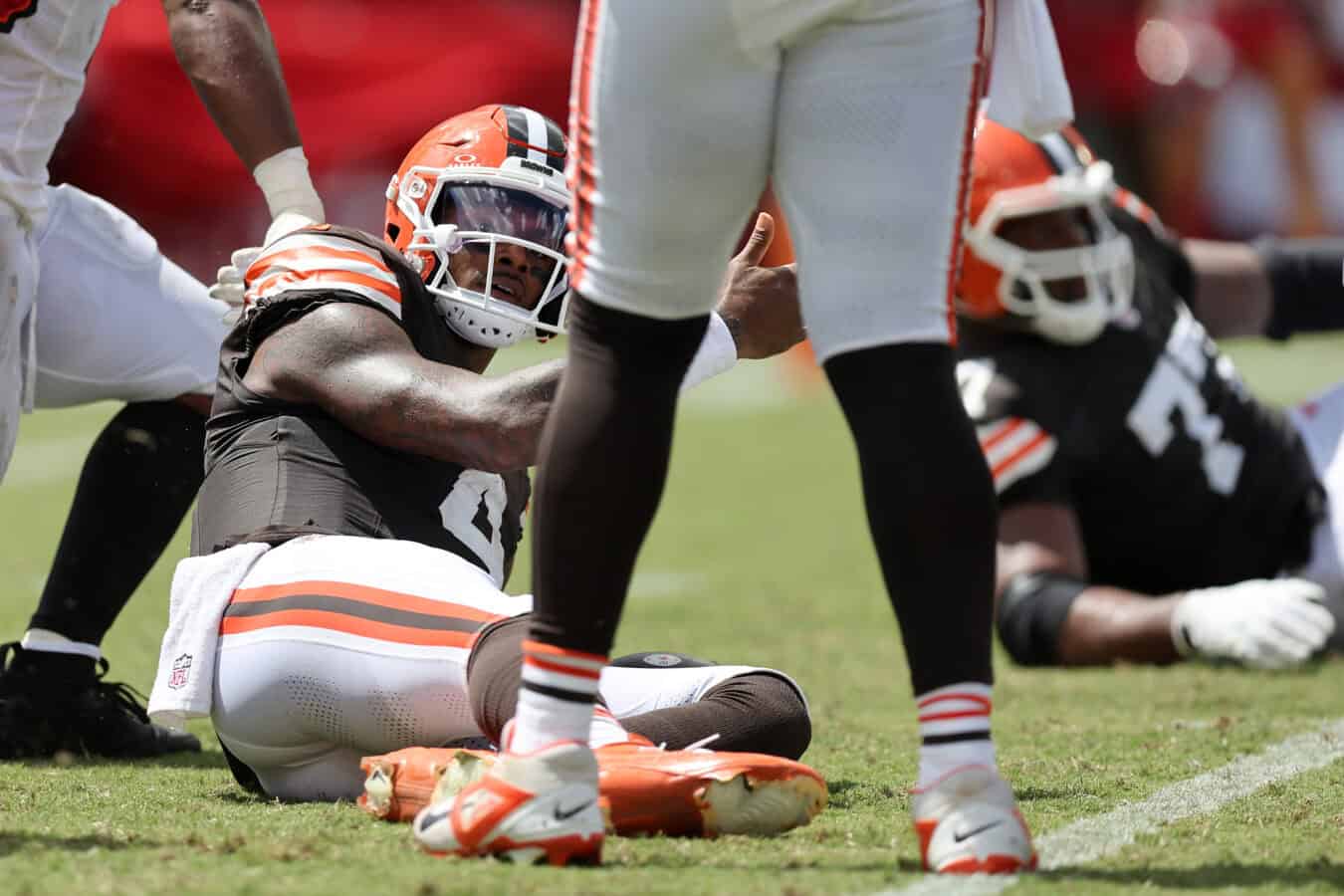 TAMPA, FLORIDA - SEPTEMBER 20: Deshaun Watson #4 of the Cleveland Browns reacts after being sacked against the Tampa Bay Buccaneers during the second quarter of the game at Raymond James Stadium on September 20, 2026 in Tampa, Florida.
