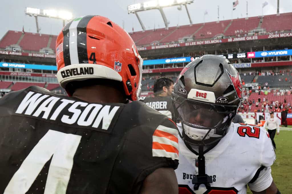 TAMPA, FLORIDA - SEPTEMBER 20: Keionte Scott #22 of the Tampa Bay Buccaneers congratulates Deshaun Watson #4 of the Cleveland Browns after the game at Raymond James Stadium on September 20, 2026 in Tampa, Florida.