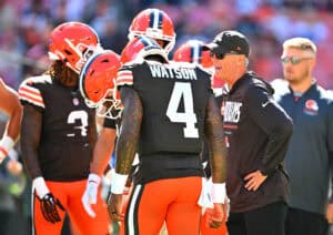 CLEVELAND, OHIO - SEPTEMBER 27: Head coach Todd Monken of the Cleveland Browns speaks with Deshaun Watson #4 prior to the game against the Carolina Panthers at Huntington Bank Field on September 27, 2026 in Cleveland, Ohio.