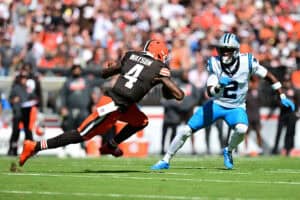 CLEVELAND, OHIO - SEPTEMBER 27: Deshaun Watson #4 of the Cleveland Browns carries the ball against Mike Jackson #2 of the Carolina Panthers during the first quarter at Huntington Bank Field on September 27, 2026 in Cleveland, Ohio.