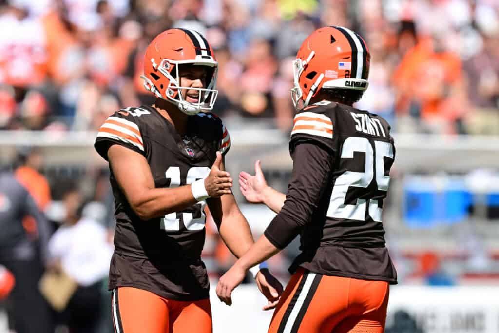 CLEVELAND, OHIO - SEPTEMBER 27: Corey Bojorquez #13 of the Cleveland Browns congratulates Andre Szmyt #25 on his field goal against the Carolina Panthers during the second quarter at Huntington Bank Field on September 27, 2026 in Cleveland, Ohio.
